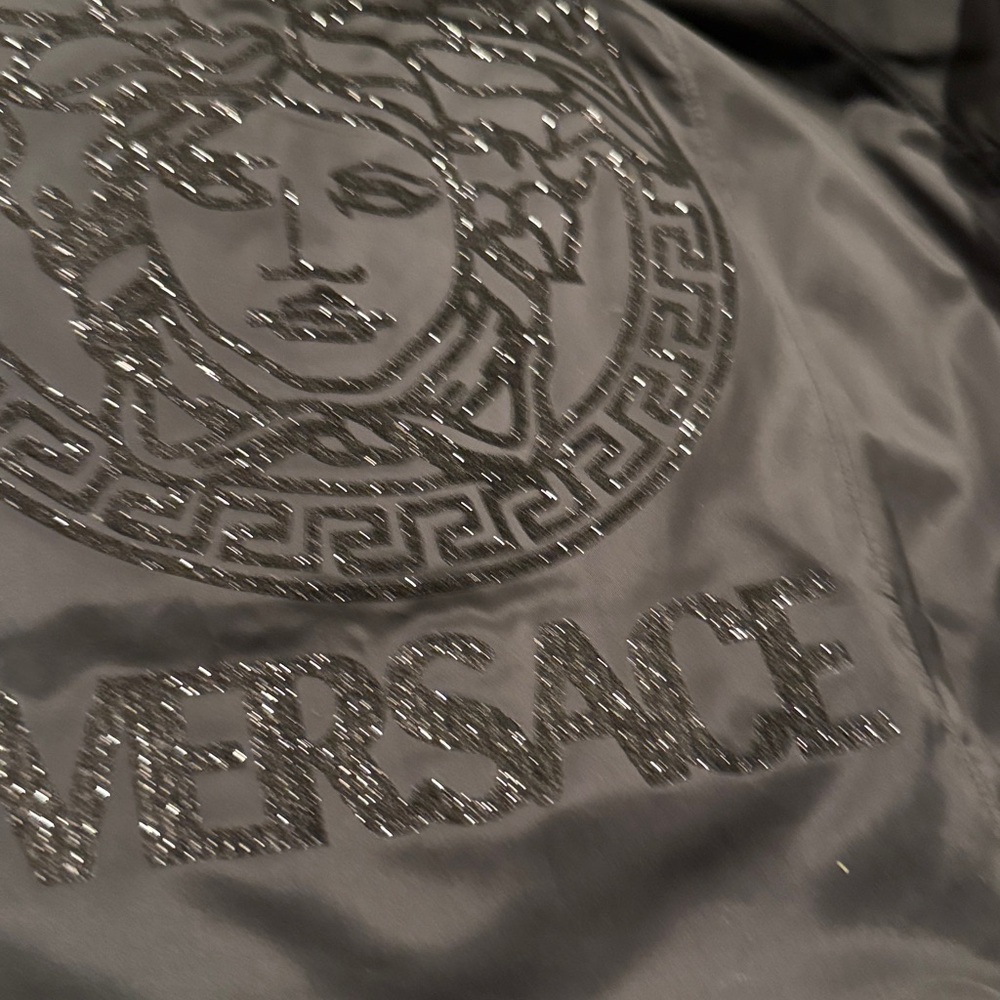 Lululemon x Versace RARE Above The Clouds Jacket
Black logo glitter aize 12 NWT - Picture 9 of 9